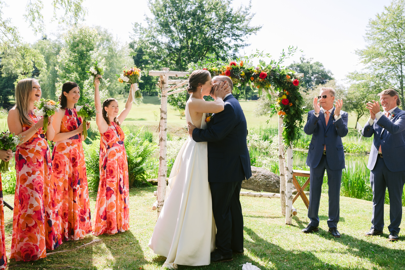 first kiss at round barn vt wedding ceremony
