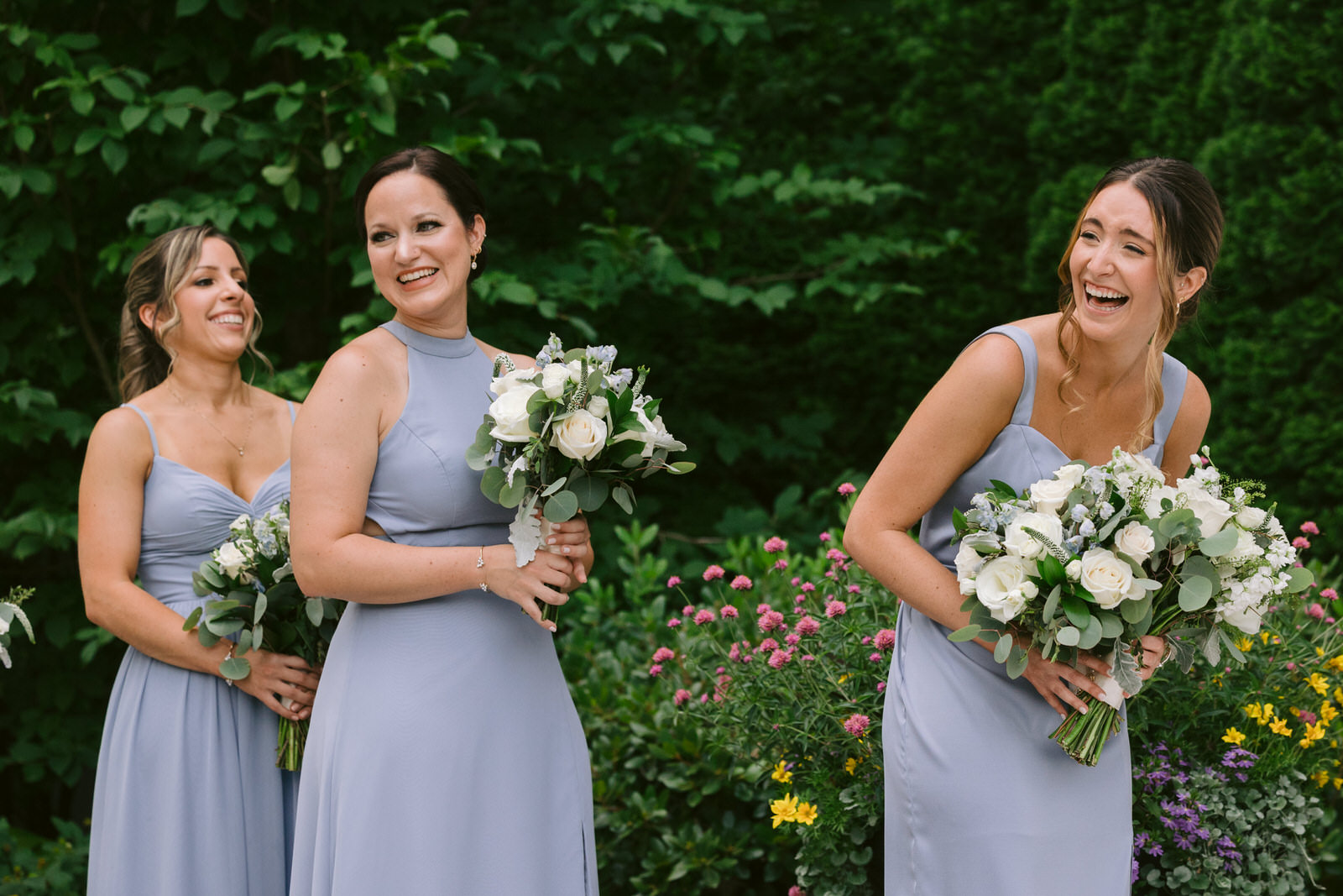 bridesmaids laughing saphire estate wedding ceremony