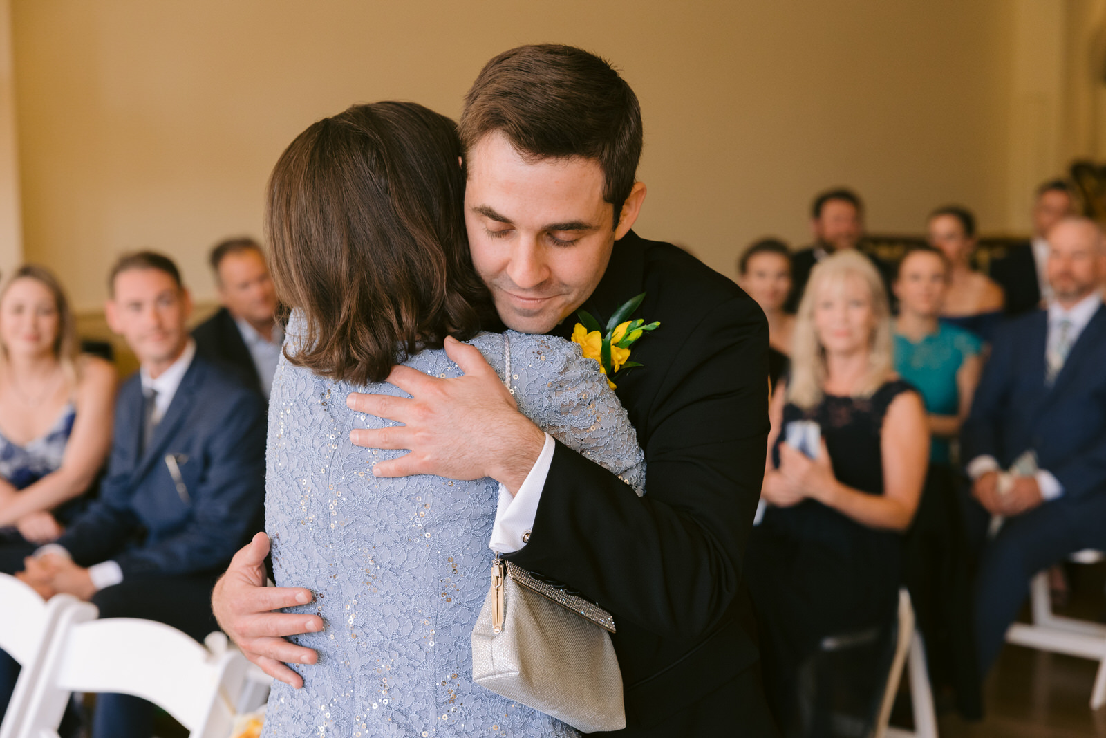 Groom with his mom at peabody essex museum wedding