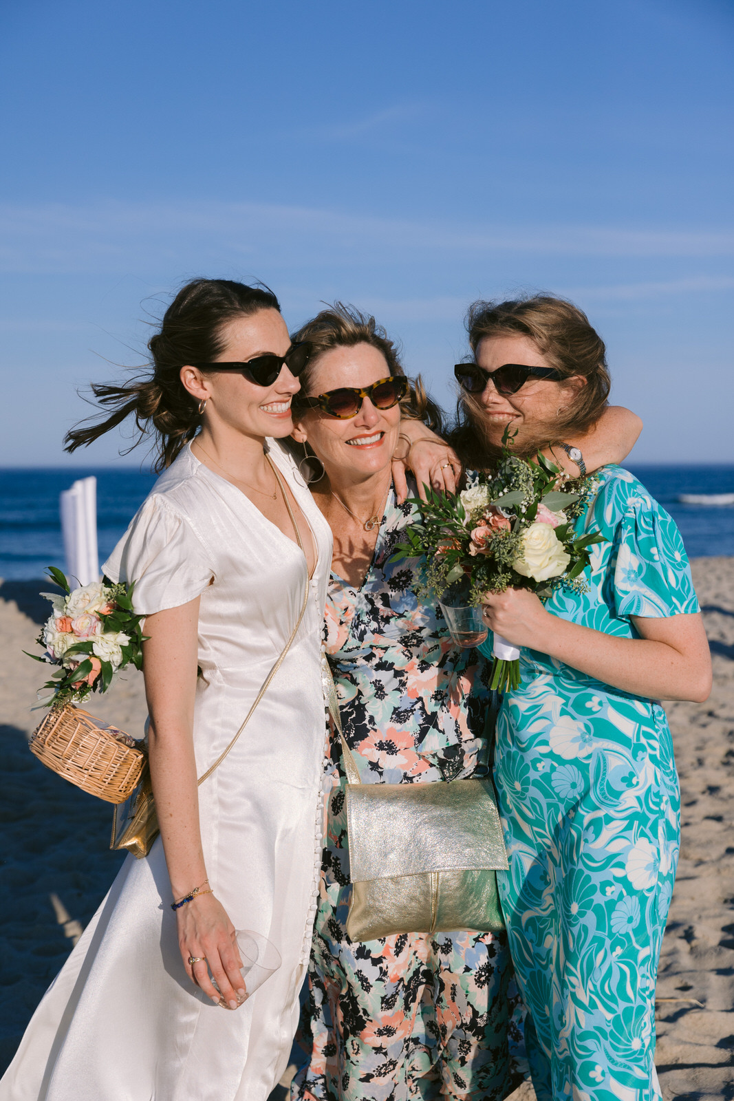 bride with mom and sister north beach island elopement